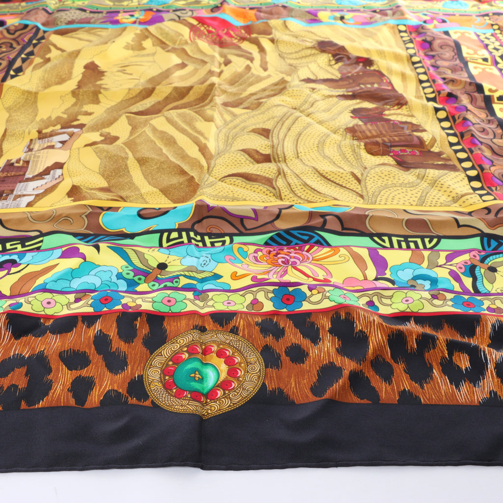 Hermès Carré 90 "La femme aux semelles de vent" Silk handkerchief in Brown x Black