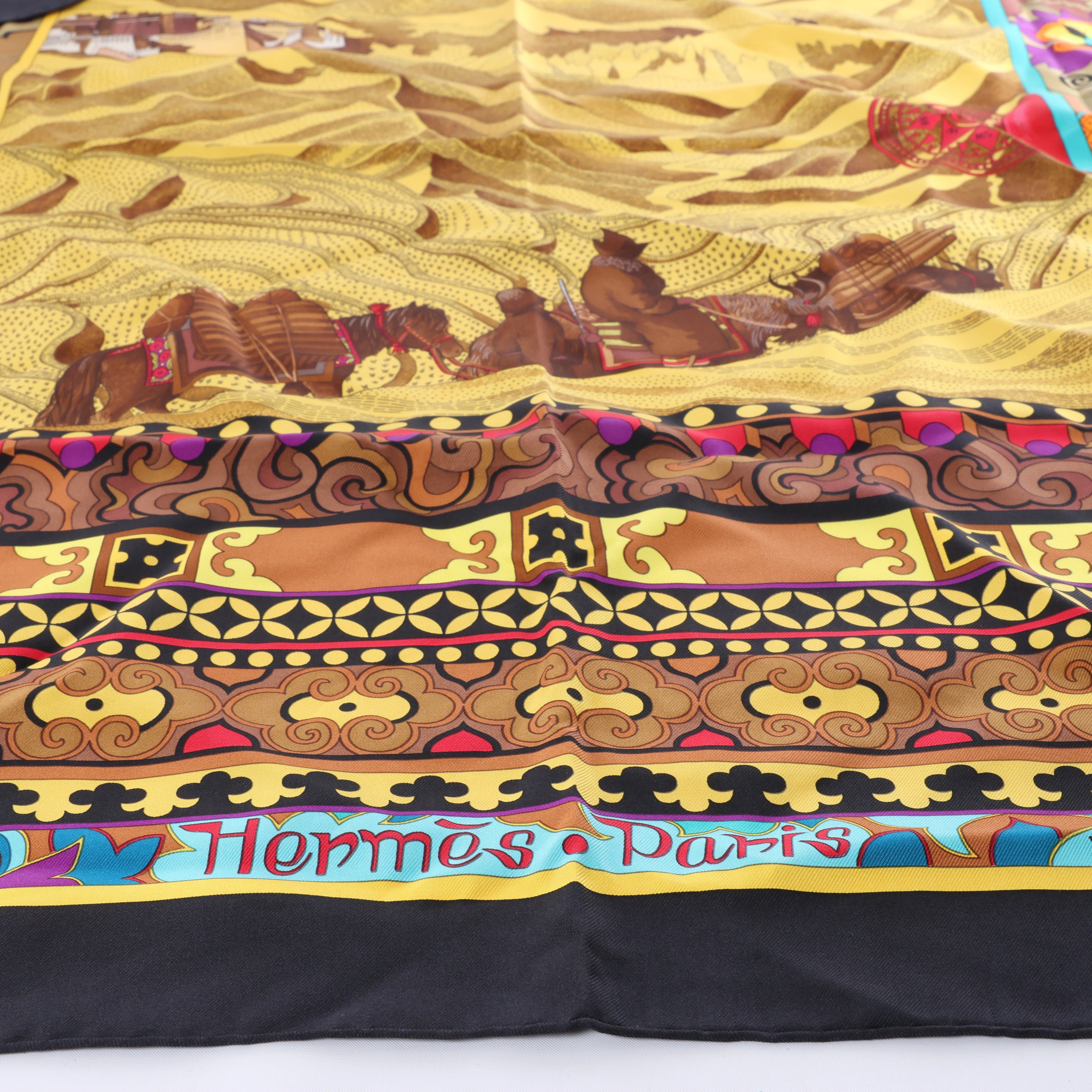 Hermès Carré 90 "La femme aux semelles de vent" Silk handkerchief in Brown x Black