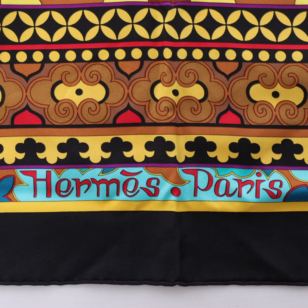 Hermès Carré 90 "La femme aux semelles de vent" Silk handkerchief in Brown x Black