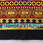 Hermès Carré 90 "La femme aux semelles de vent" Silk handkerchief in Brown x Black