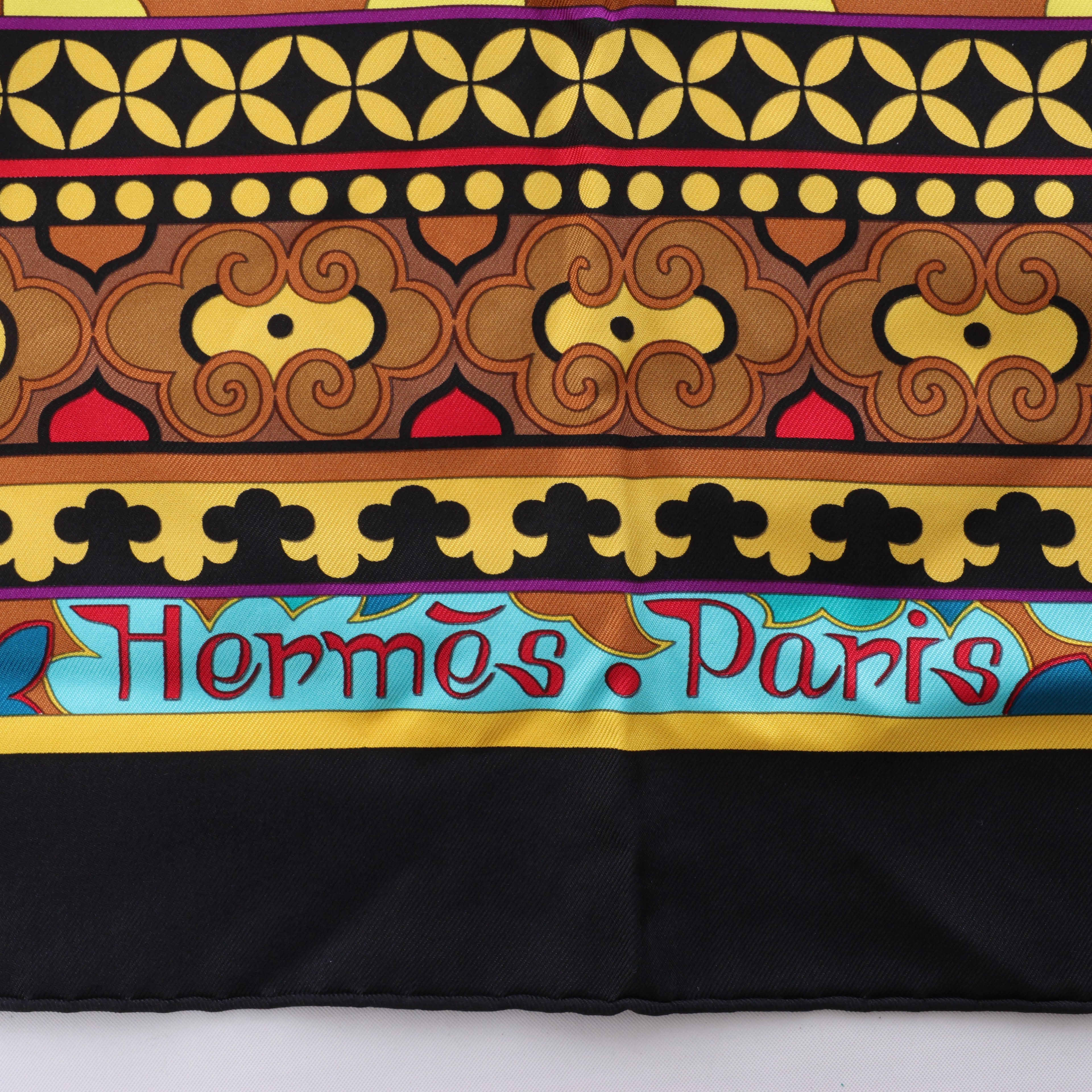 Hermès Carré 90 "La femme aux semelles de vent" Silk handkerchief in Brown x Black