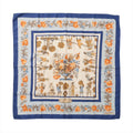 Blue Hermès Carré 90 silk scarf with orange floral border, illustrated garden figures and a large central flower arrangement.