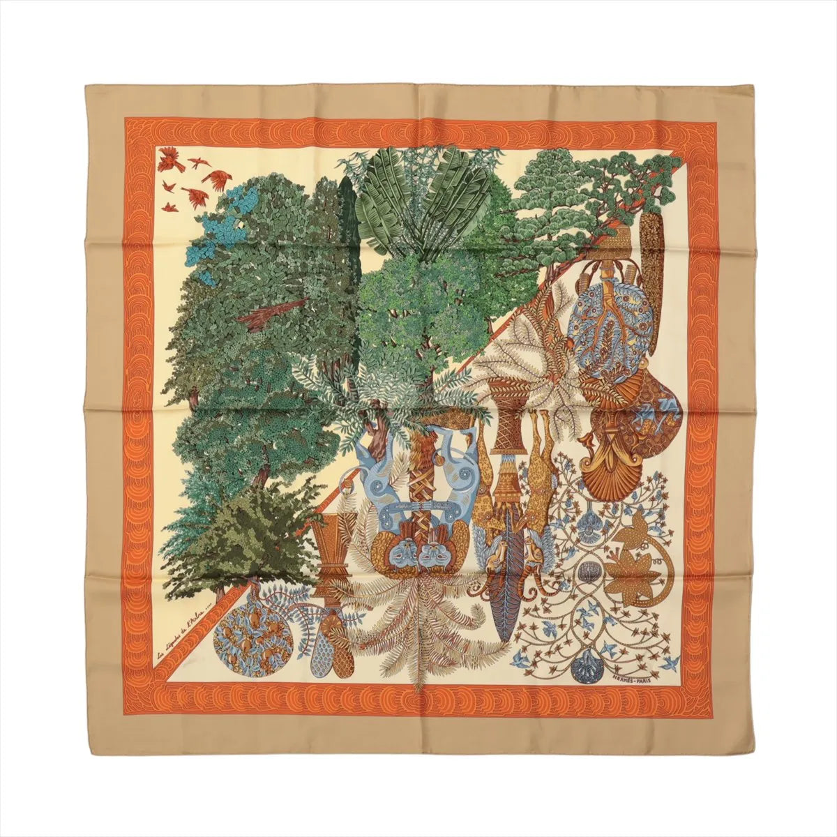 Hermès Carré 90 "Les Légendes de L'Arbre" silk scarf in beige with lush green trees, intricate forest motifs, and orange decorative border.