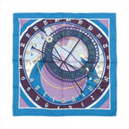 Hermès Carré 90 silk scarf in blue with a clock-themed design, zodiac symbols, Roman numerals and layered circular graphics in blue and lavender.