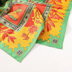 Hermès Carré 90 "MUSIQUE DES DIEUX" Silk handkerchief in Orange x Green