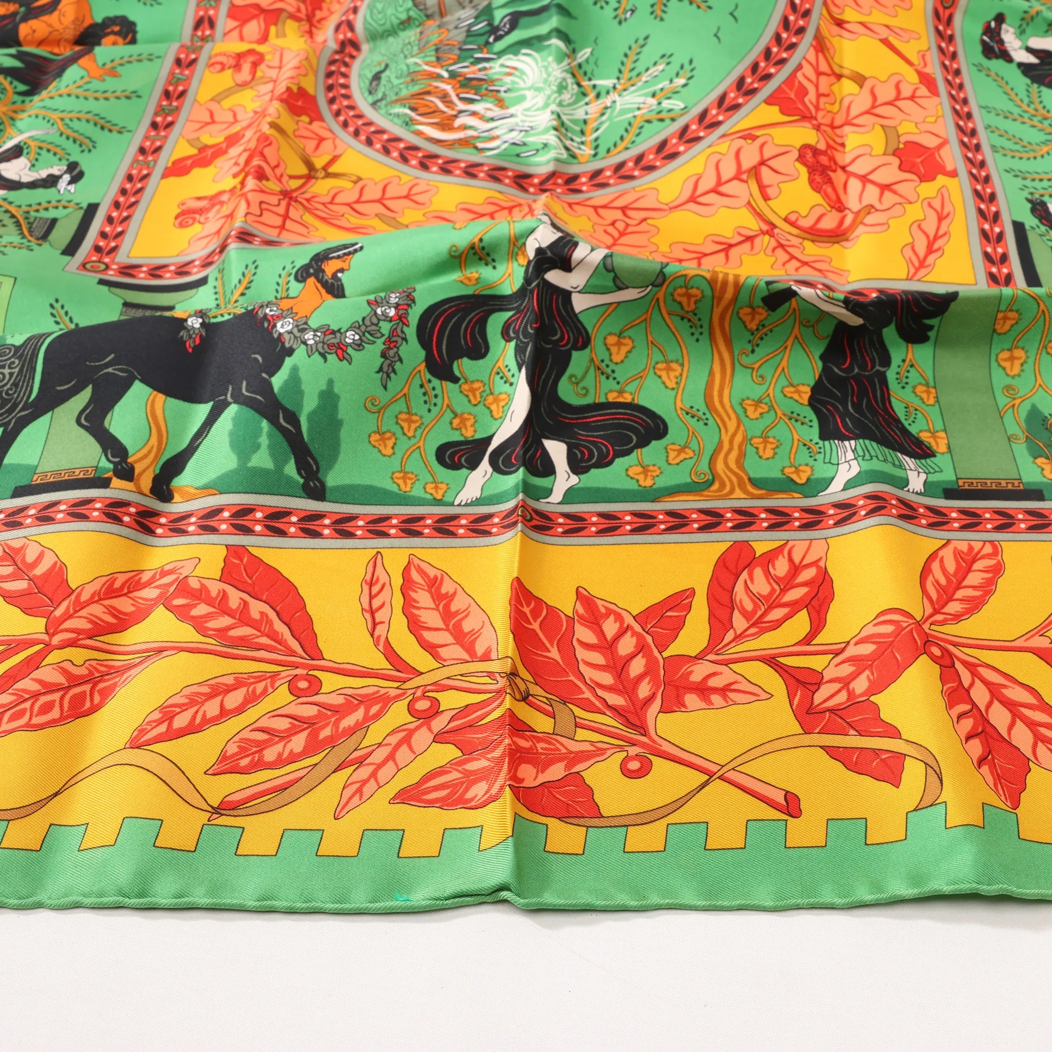Hermès Carré 90 "MUSIQUE DES DIEUX" Silk handkerchief in Orange x Green