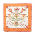 Hermès Carré 90 silk scarf titled “Parures des Sables” featuring intricate, colorful jewelry motifs on a white background with an orange border.