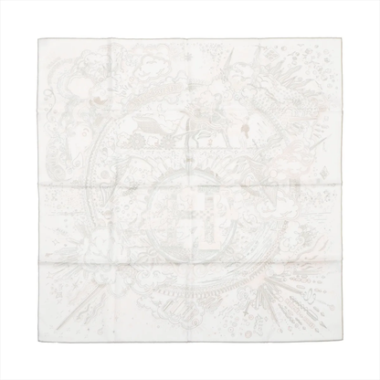 Top-down view of Hermès Carré 90 "Please Hold the Line" silk handkerchief in white, showcasing intricate tonal line-art illustrations of clouds, figures, and abstract elements surrounding a central "H" motif, all in soft grey and beige tones.