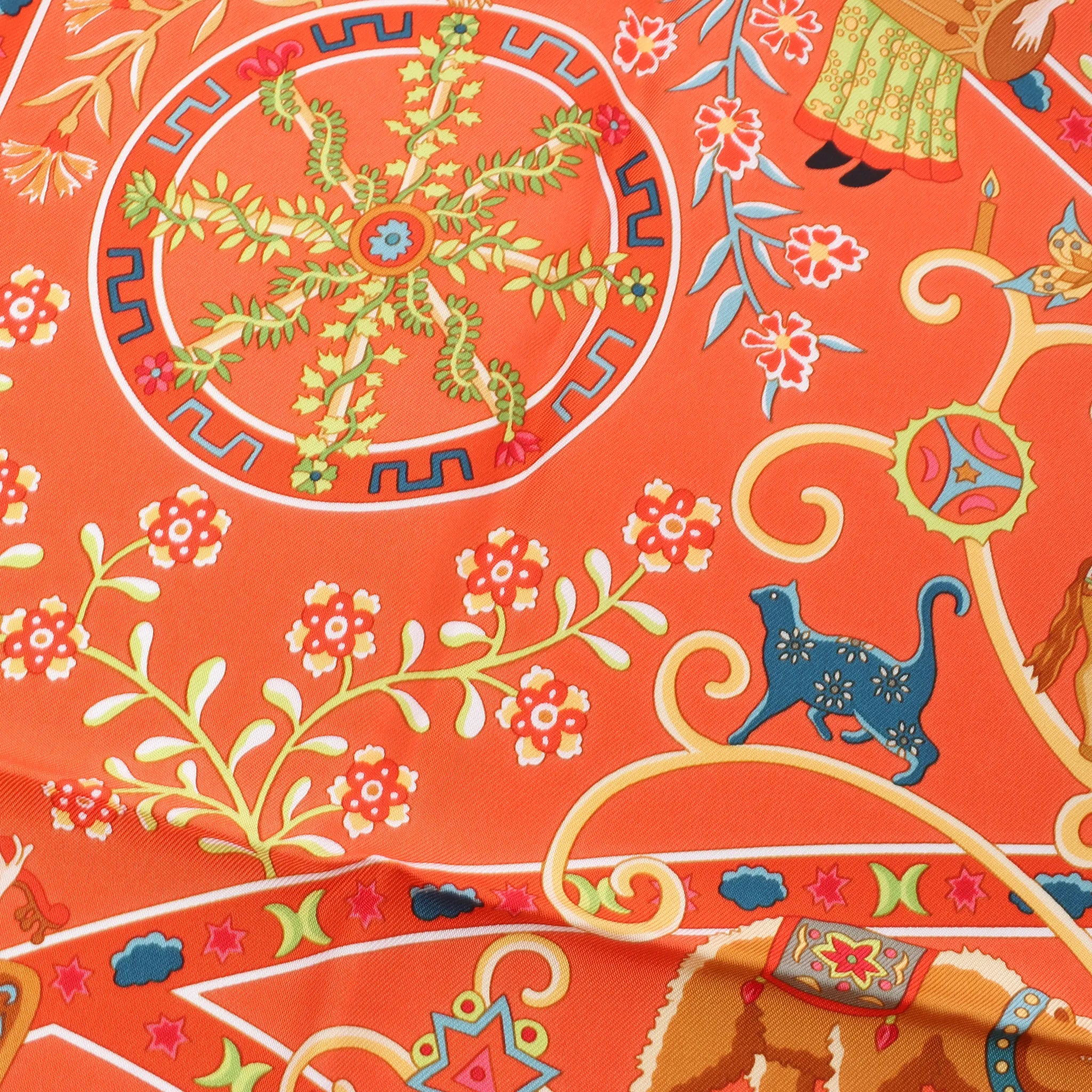Hermès Carré 90 "Peuple du Vent" Silk handkerchief in Orange