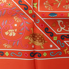 Hermès Carré 90 "Peuple du Vent" Silk handkerchief in Orange
