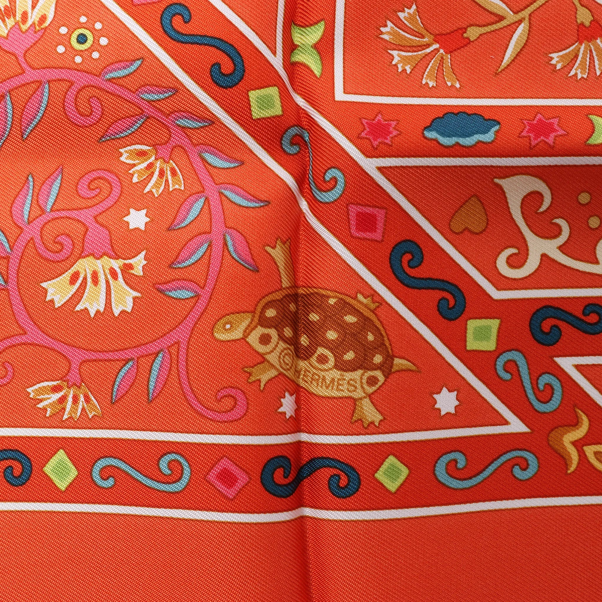 Hermès Carré 90 "Peuple du Vent" Silk handkerchief in Orange