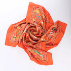 Hermès Carré 90 "Peuple du Vent" Silk handkerchief in Orange
