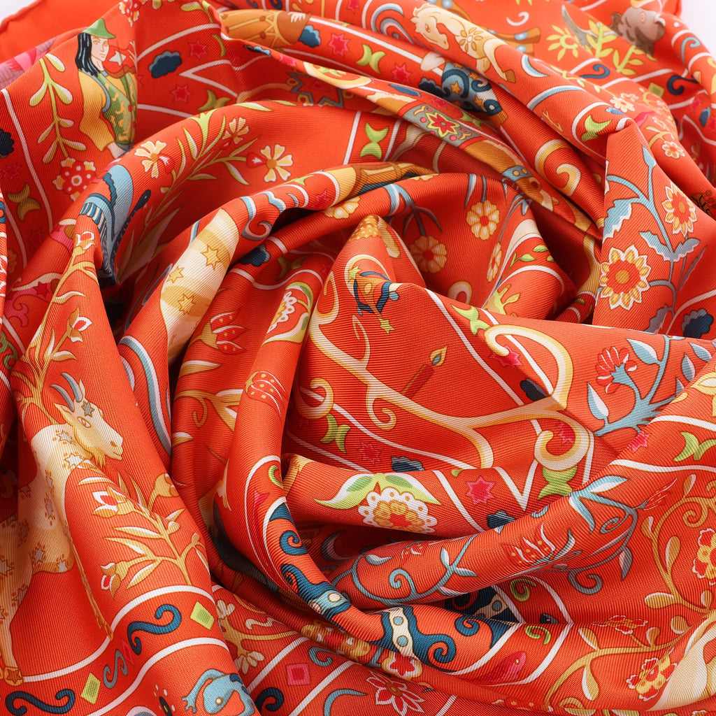 Hermès Carré 90 "Peuple du Vent" Silk handkerchief in Orange