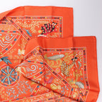Hermès Carré 90 "Peuple du Vent" Silk handkerchief in Orange