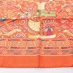 Hermès Carré 90 "Peuple du Vent" Silk handkerchief in Orange