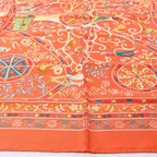 Hermès Carré 90 "Peuple du Vent" Silk handkerchief in Orange