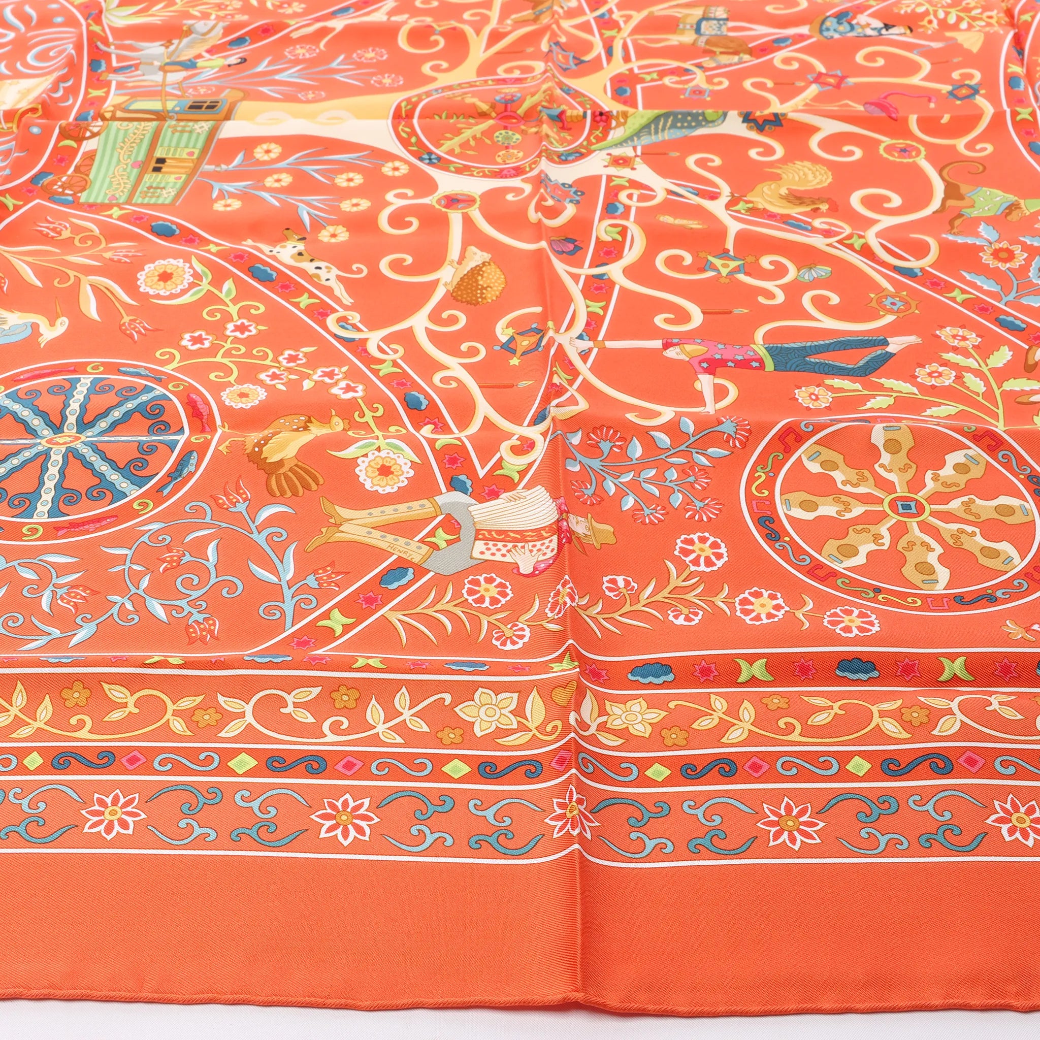 Hermès Carré 90 "Peuple du Vent" Silk handkerchief in Orange