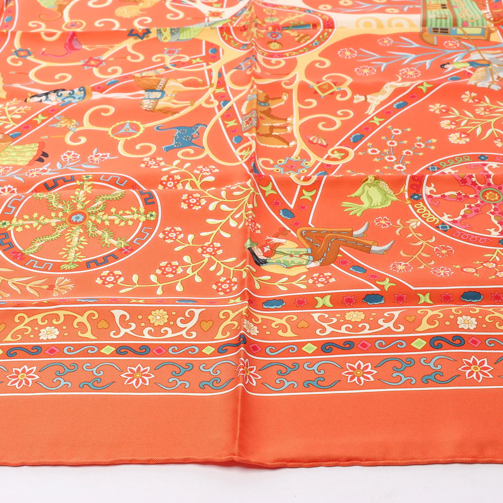 Hermès Carré 90 "Peuple du Vent" Silk handkerchief in Orange