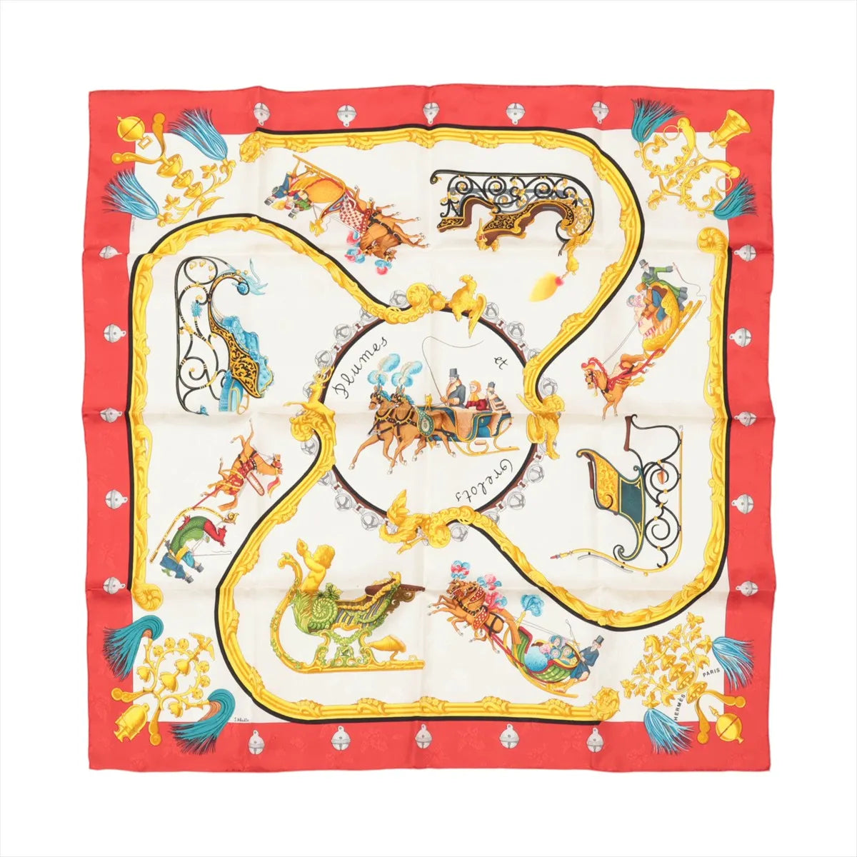 Hermès Carré 90 red silk scarf with gold ornate frame, equestrian carriage illustrations, and blue tassel motifs on a cream background.