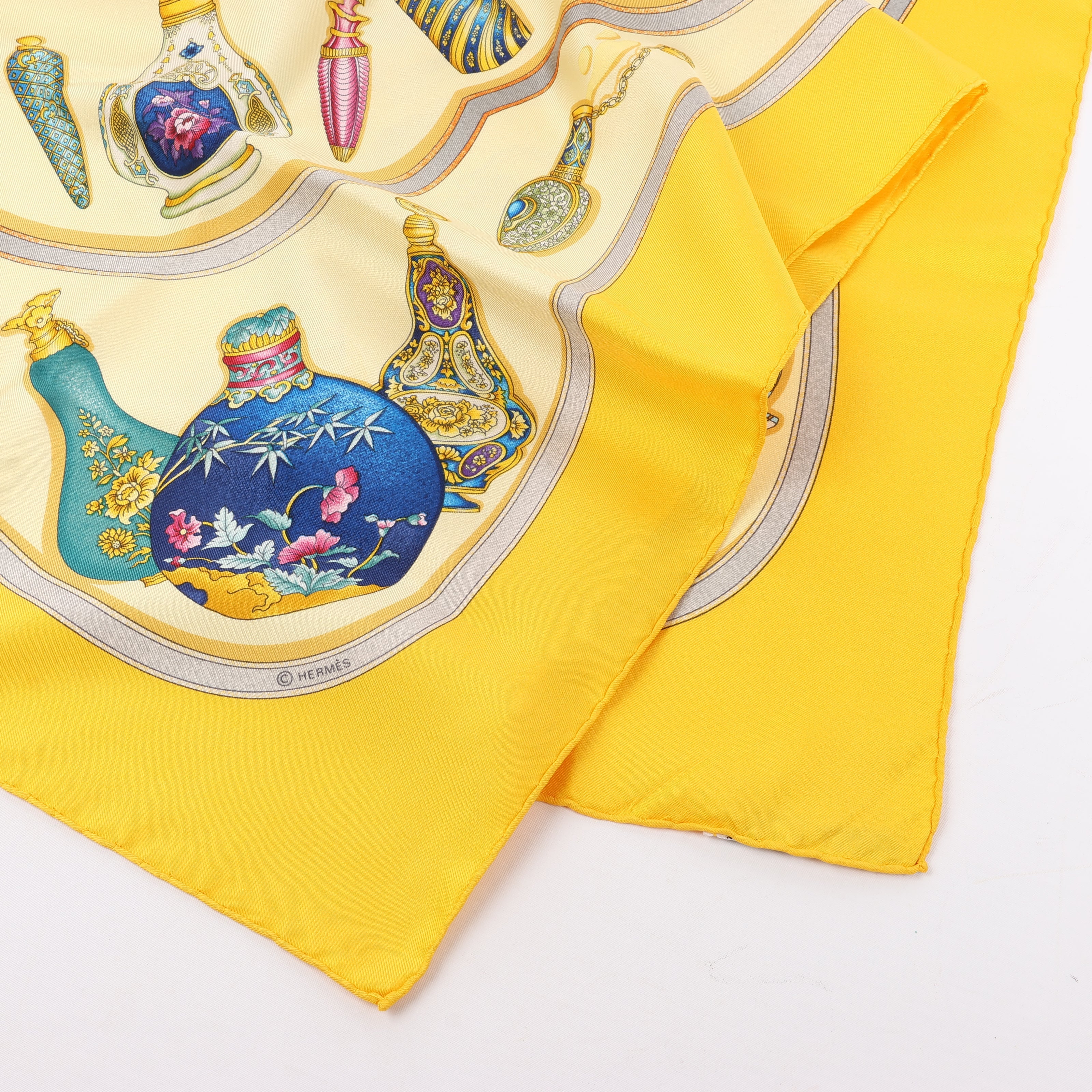 Hermès Carré 90 "Qu'importe le flacon" 100% Silk Scarf in Yellow