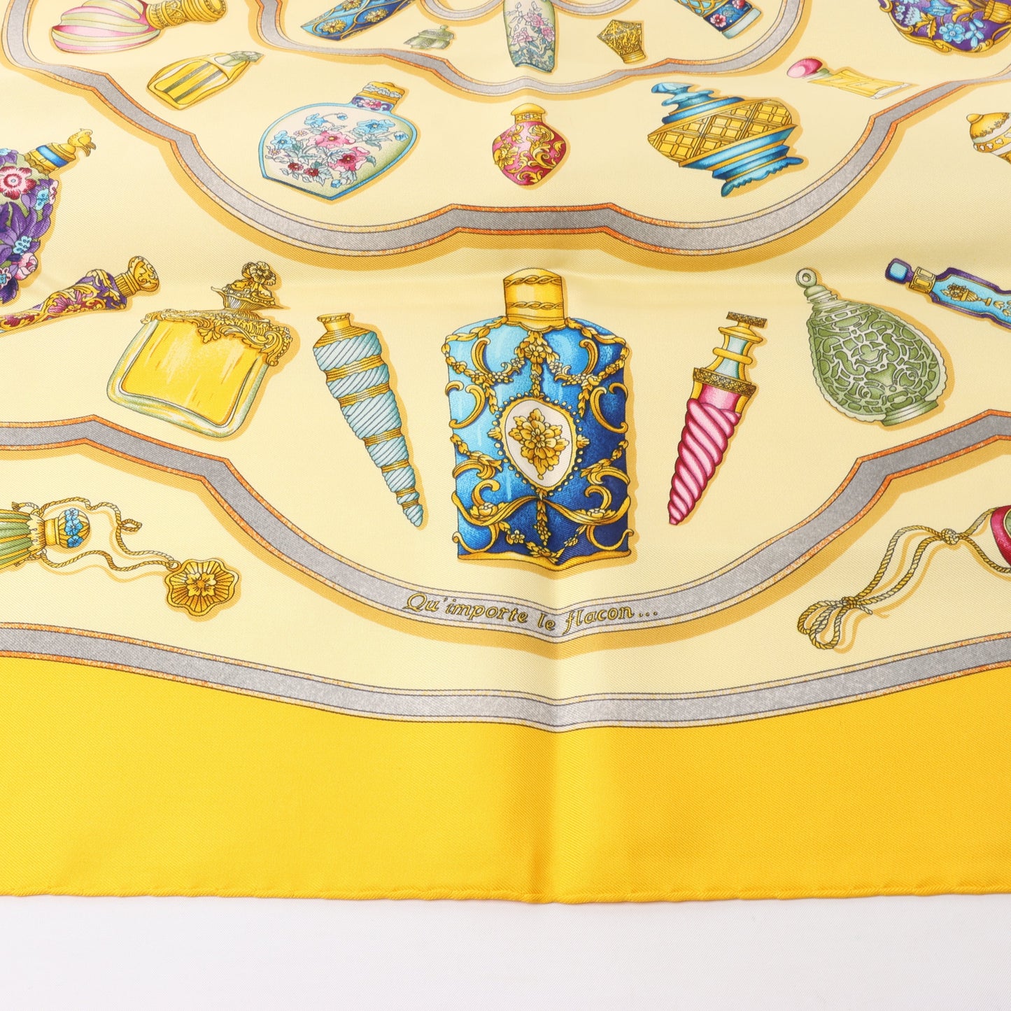 Hermès Carré 90 "Qu'importe le flacon" 100% Silk Scarf in Yellow