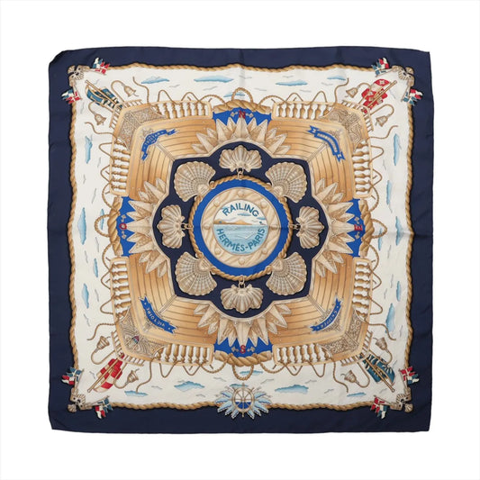 Hermès Carré 90 "RAILING" silk handkerchief in navy blue, featuring a symmetrical maritime-inspired print with ropes, shells, ships, and a central “Hermès-Paris” emblem, displayed flat against a white background.