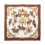 Hermès Carré 90 brown and ivory silk scarf with mounted riders, horses, ornate bridles and gold equestrian hardware.