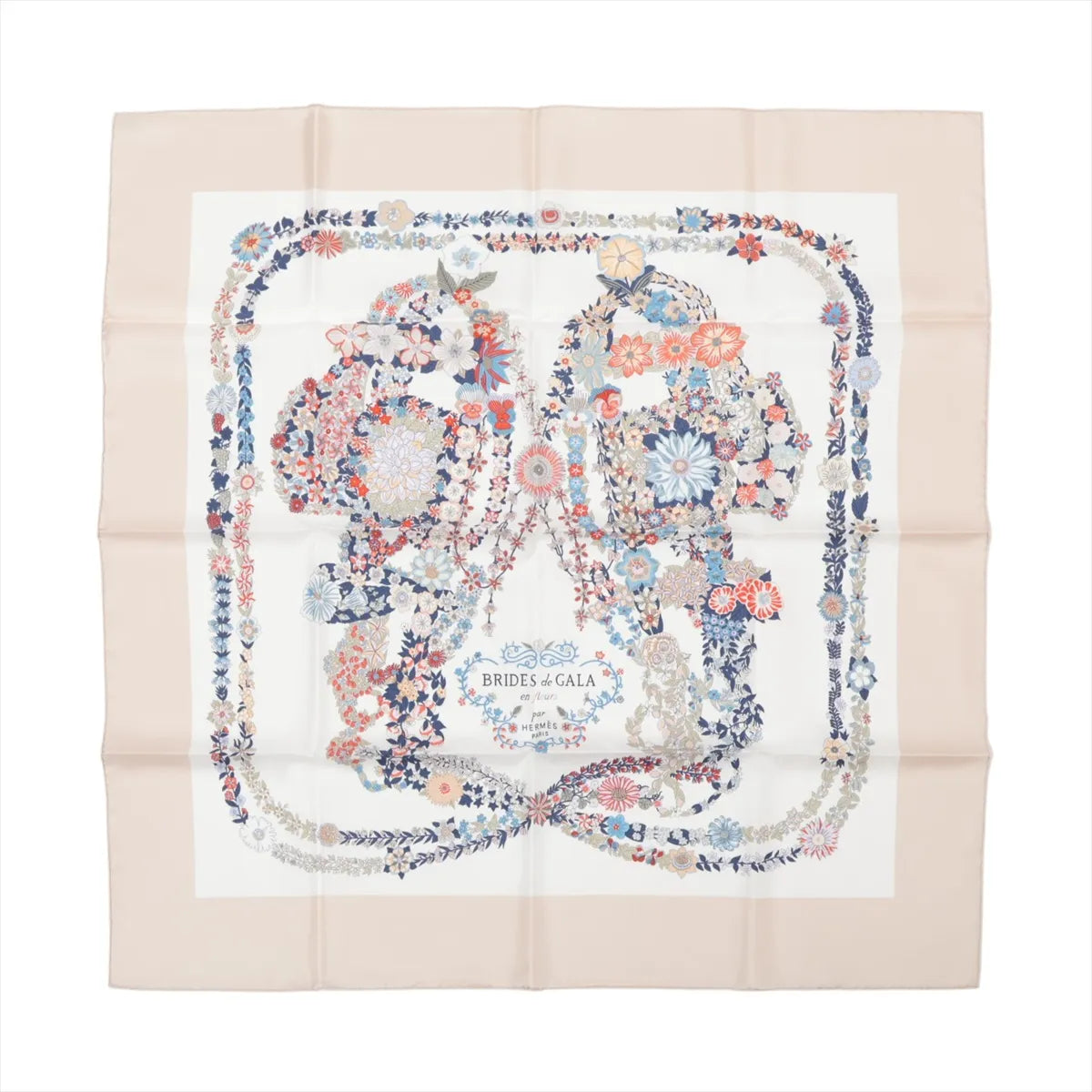 Hermès Carré 90 "Brides de Gala en Fleurs" silk scarf in beige featuring a detailed floral interpretation of bridles in blue, red, and white tones with a soft border.