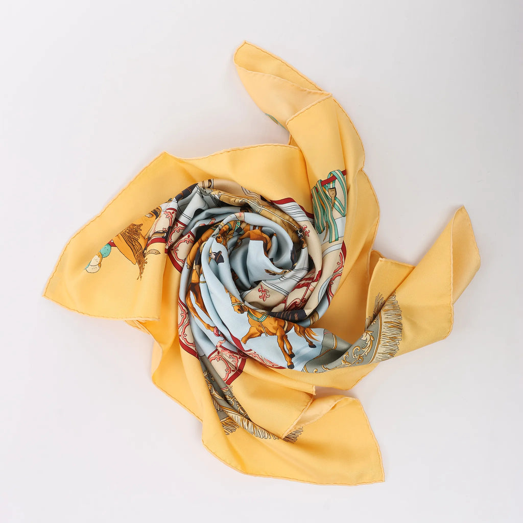 Hermès Carré 90 "Real Escuela Andaluza Del Arte Ecuestre" Silk handkerchief in Yellow