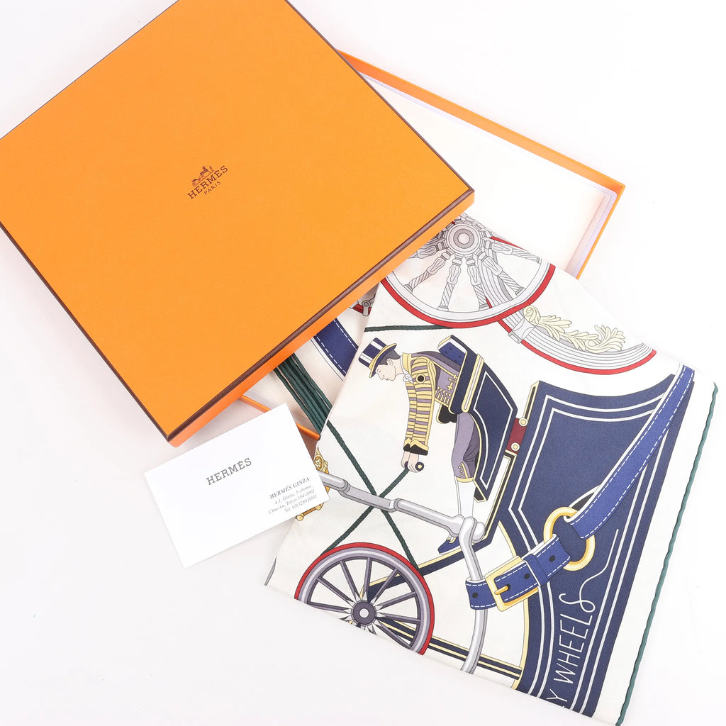 Hermès Carré 90 "STATELY WHEELS" Silk handkerchief in Ecru x Blue