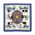 Hermès Carré 90 silk scarf in blue with cream center, carriage illustrations, geometric medallion motif, and blue border, laid flat