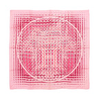 Hermès Carré 90 “Ginza 10th Anniversary” silk scarf in pink with layered grid pattern and central circular motif, Hermès Paris text at edge.