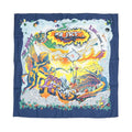 Hermès Carré 90 navy blue silk scarf with colorful graphic artwork, winged figures, “CUBE” and “PARIS” text, and a dark blue border