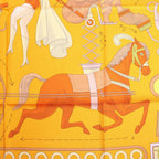 Pañuelo de seda Hermès Carré 90 "Té para dos" en color naranja