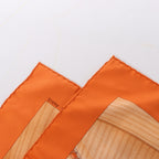 Pañuelo Hermès Carré 90 "Puzzle" 100 % seda en color naranja
