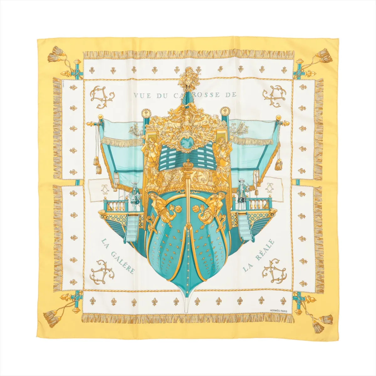 Hermès Carré 90 silk scarf titled "Vue du Carrosse de la Galère La Réale," featuring an ornate baroque ship in turquoise and gold with intricate detailing, surrounded by nautical motifs and tassels, set against a white background with a rich yellow border.