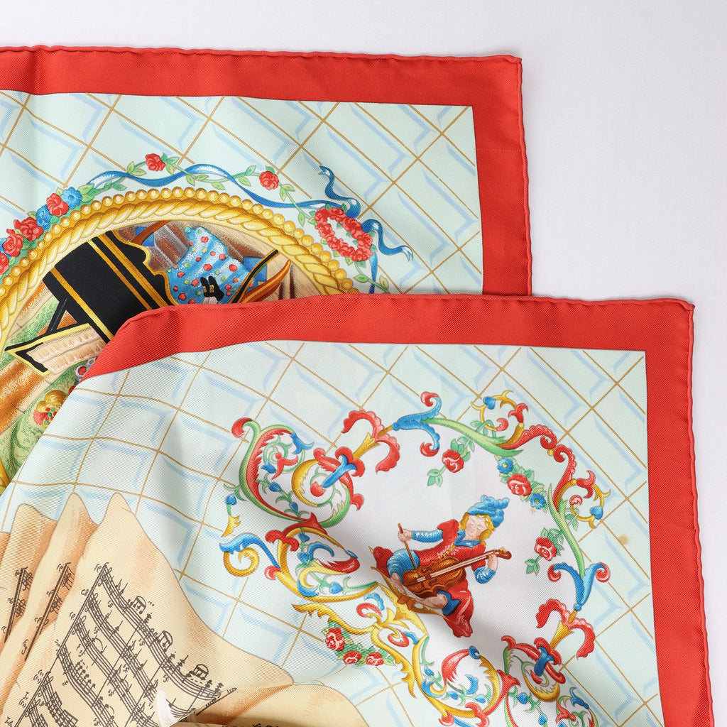 Hermès Carré 90 "Hommage à Mozart" Silk handkerchief in Red x Blue