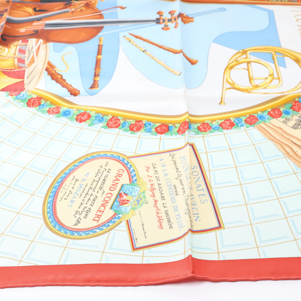 Hermès Carré 90 "Hommage à Mozart" Silk handkerchief in Red x Blue