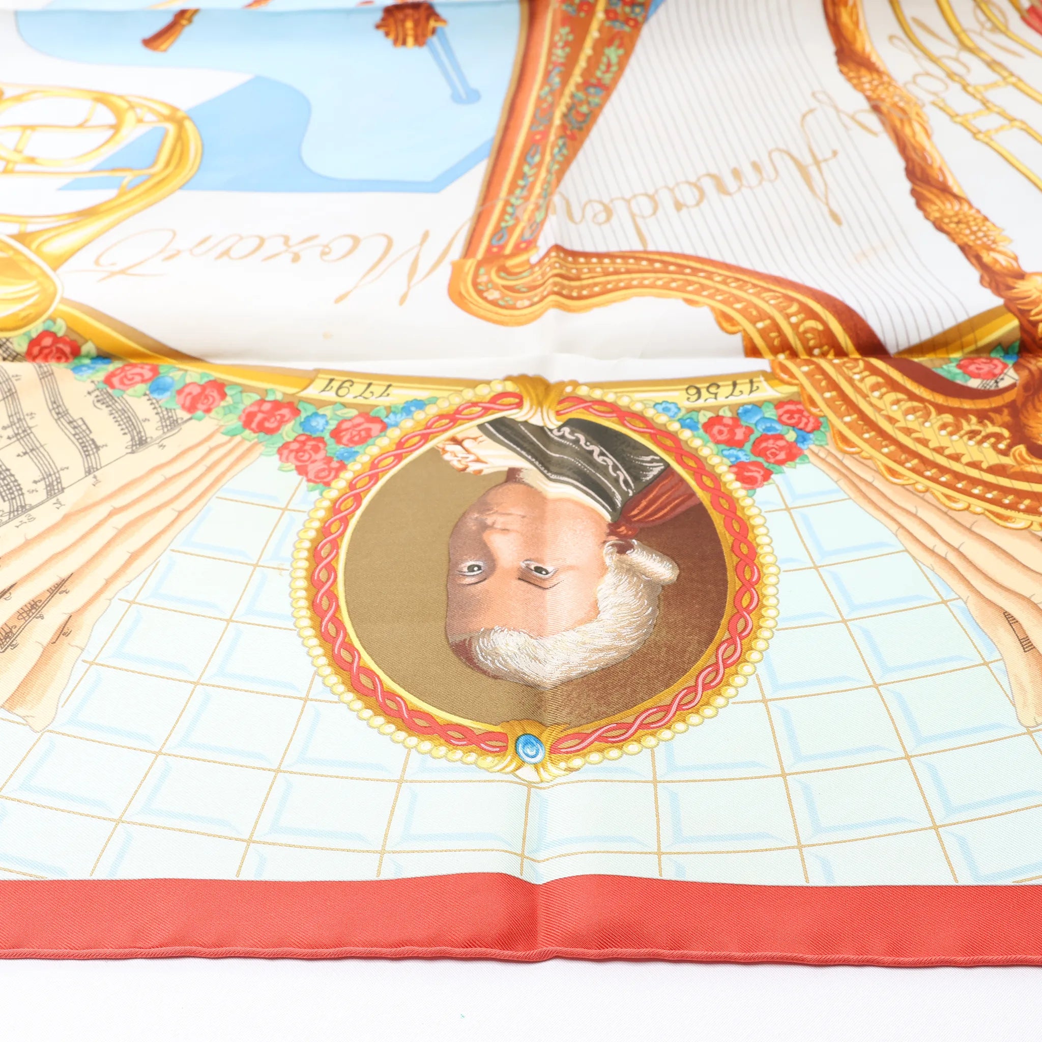 Hermès Carré 90 "Hommage à Mozart" Silk handkerchief in Red x Blue
