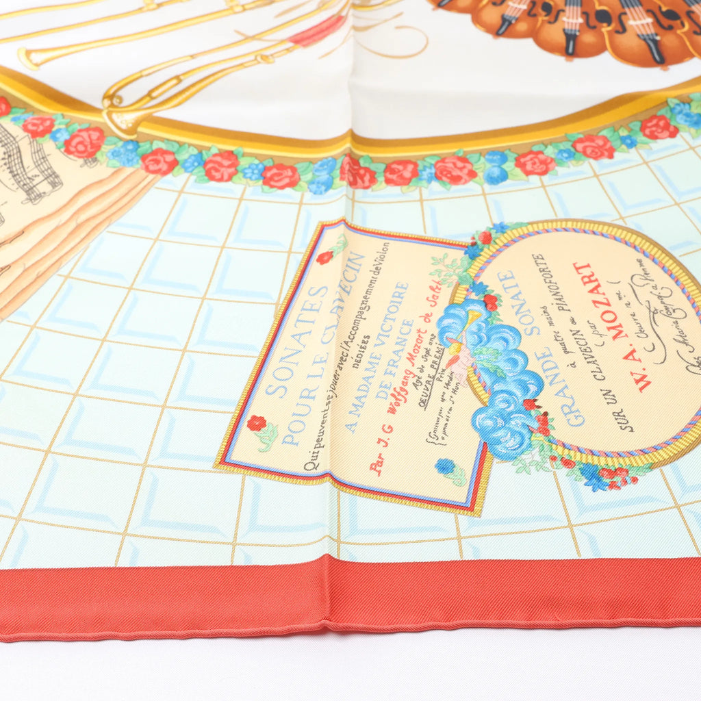 Hermès Carré 90 "Hommage à Mozart" Silk handkerchief in Red x Blue