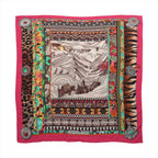 Hermès Carré Géant scarf in pink cashmere and silk with mountain landscape artwork, animal-print borders, colorful patterns and jewelry motifs.