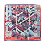 Hermès Carré Géant scarf in blue, red, and white with abstract zigzag strap and buckle pattern, geometric ribbon-like bands, and red border.