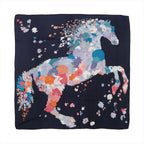 Hermès Carré Géant "Robe Légère" scarf in navy blue featuring a large horse silhouette formed by multicolored floral patterns, crafted in a soft cashmere and silk blend.