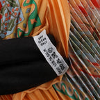 Hermès Carre 90 "Axis Mundi" Plissé Scarf Silk in Orange