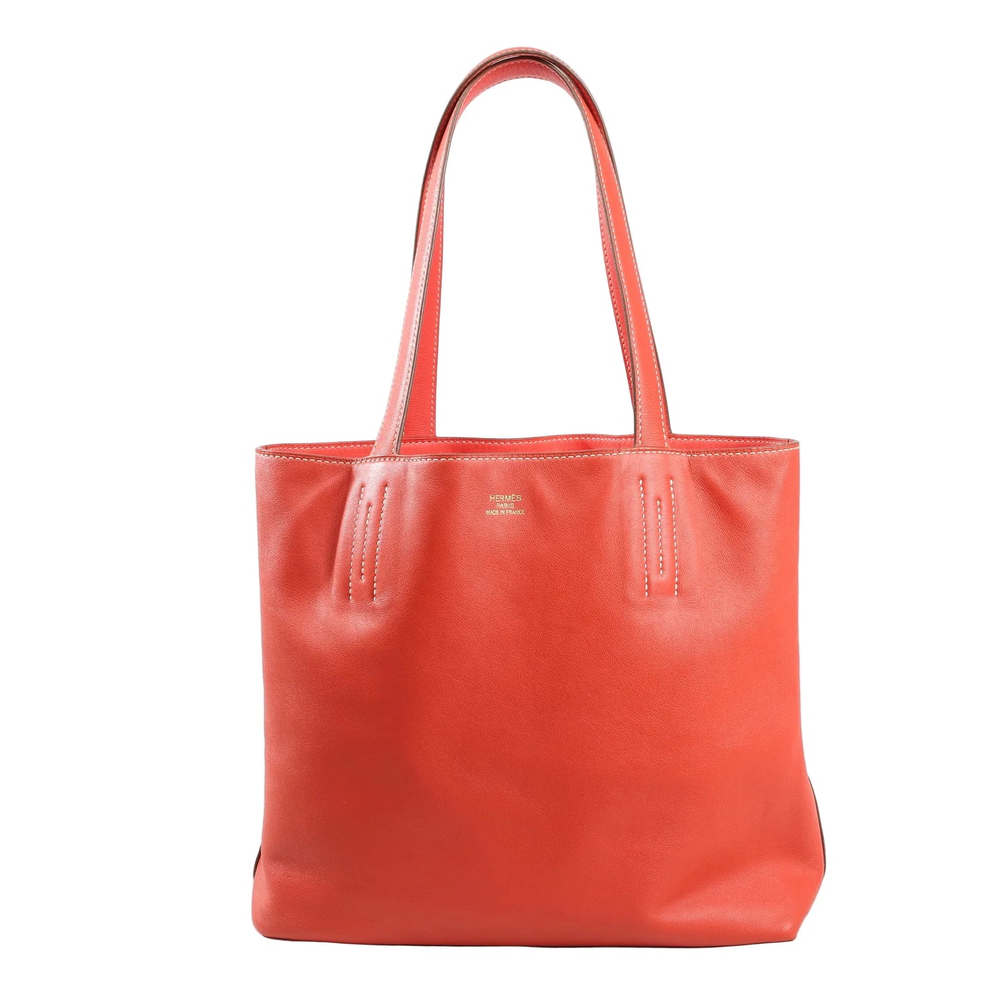 HERMÈS Double Sens 28 Shoulder Bag in Sanguine Veau Swift leather with tonal stitching, long flat handles, and minimalist design, shown in outward-facing Sanguine color on a white background.