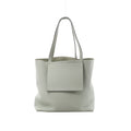 Light gray Hermès Cabasellier 46 pebbled leather tote with long shoulder handles, open top and large rectangular front pocket.