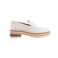 White Hermès Ivy leather loafer with penny strap, rounded toe, layered brown-and-white sole, block heel and chunky lug tread.