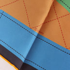 Hermès Carré 90 Double Face "Tapis de Selle" Silk handkerchief in Orange