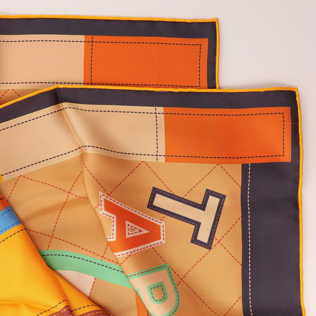 Hermès Carré 90 Double Face "Tapis de Selle" Silk handkerchief in Orange