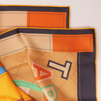 Hermès Carré 90 Double Face "Tapis de Selle" Silk handkerchief in Orange